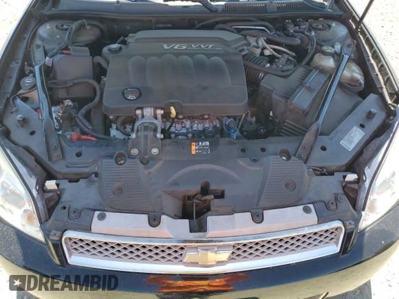 2014 Chevrolet Impala LS z VIN 2G1WA5E37E1173896, wystawiony jako Copart lot #57906265 z przebiegiem 147 887 mil mil oraz Czysty tytuł • Clean title. Historia ofert i sprzedaży dostępna na DreamBid. Obrazek 11.