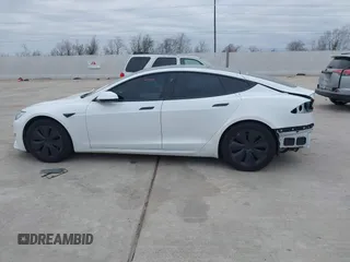2021 Tesla Model S Plaid z VIN 5YJSA1E64MF452744, wystawiony jako IAAI lot #41375136 z przebiegiem Nie podano mil oraz . Historia ofert i sprzedaży dostępna na DreamBid. Obrazek 13.