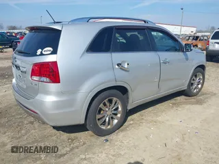 2012 Kia Sorento SX with VIN 5XYKWDA23CG194617, listed as a IAAI auction lot 41504630 with 161,157 mi miles. Bid and sale history available at carsss.com. Image 4.
