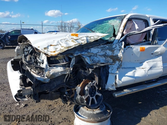 2015 Toyota Tacoma with VIN 3TMLU4EN8FM200529, listed as a IAAI auction lot 41602598 with 98,456 mi miles and . Bid and sale history available at DreamBid. Image 6.
