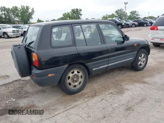 1997 Toyota RAV4 with VIN JT3HP10V6V7051229, listed as a IAAI auction lot 42762280 with 228,719 mi miles and . Bid and sale history available at DreamBid. Image 4.