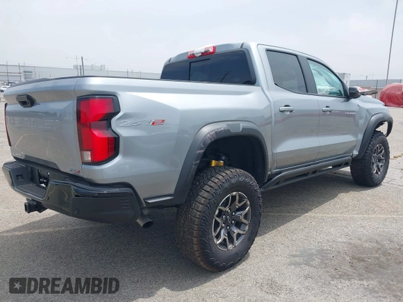 2024 Chevrolet Colorado 4WD ZR2 with VIN 1GCPTFEK9R1177298, listed as a IAAI auction lot 42064294 with 3,827 mi miles and . Bid and sale history available at DreamBid. Image 4.
