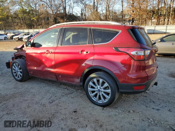 2017 Ford Escape Titanium with VIN 1FMCU0J94HUD34112, listed as a Copart auction lot 85837974 with 127,576 mi miles and Salvage Title. Bid and sale history available at carsss.com. Image 2.