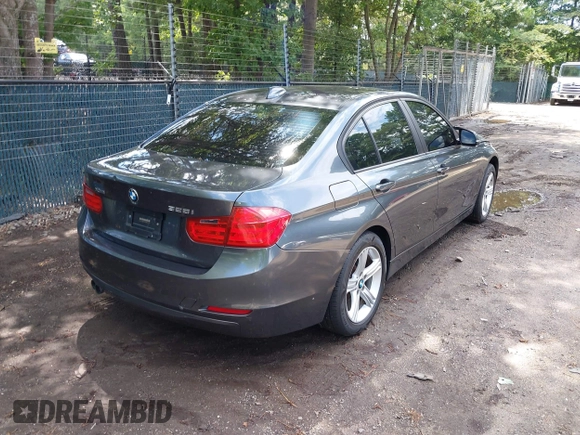 2013 BMW 3 Series 328i xDrive with VIN WBA3B5G53DNS05713, listed as a IAAI auction lot 42768480 with 133,851 mi miles and . Bid and sale history available at DreamBid. Image 4.