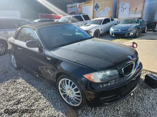 2010 BMW 1 Series 128i with VIN WBAUL7C52AVJ77448, listed as a IAAI auction lot 41886372 with 97,567 mi miles. Bid and sale history available at carsss.com. Image 1.