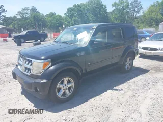2007 Dodge Nitro SLT with VIN 1D8GU58K37W682094, listed as a IAAI auction lot 42155006 with 115,748 mi miles. Bid and sale history available at carsss.com. Image 2.