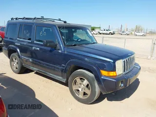 2009 Jeep Commander Sport z VIN 1J8HH48K39C505415, wystawiony jako IAAI lot #42576687 z przebiegiem 213 308 mil mil oraz . Historia ofert i sprzedaży dostępna na DreamBid. Obrazek 1.