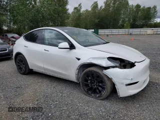 2023 Tesla Model Y Long Range z VIN 7SAYGDEE3PF751019, wystawiony jako Copart lot #57972885 z przebiegiem 24 591 mil mil oraz Szkoda całkowita • Salvage title. Historia ofert i sprzedaży dostępna na DreamBid. Obrazek 4.