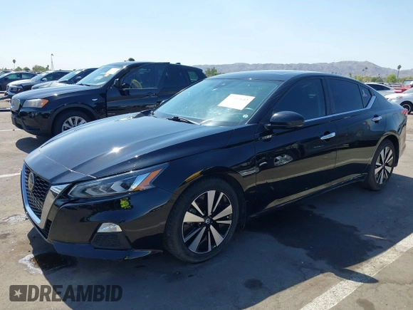 2021 Nissan Altima SV with VIN 1N4BL4DV0MN384955, listed as a IAAI auction lot 42353612 with 78,685 mi miles and . Bid and sale history available at DreamBid. Image 2.