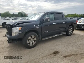 2017 Nissan Titan SV with VIN 1N6AA1E57HN559231, listed as a Copart auction lot 56126795 with 143,019 mi miles and Salvage title. Bid and sale history available at DreamBid. Image 1.