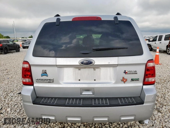2012 Ford Escape XLT z VIN 1FMCU9DG5CKA92739, wystawiony jako Copart lot #62380375 z przebiegiem 68 755 mil mil oraz Szkoda całkowita • Salvage title. Historia ofert i sprzedaży dostępna na DreamBid. Obrazek 6.