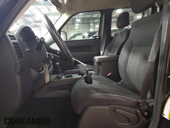 2011 Jeep Liberty Sport with VIN 1J4PN2GK5BW521504, listed as a Copart auction lot 53458415 with 106,120 mi miles and Salvage Title. Bid and sale history available at carsss.com. Image 7.