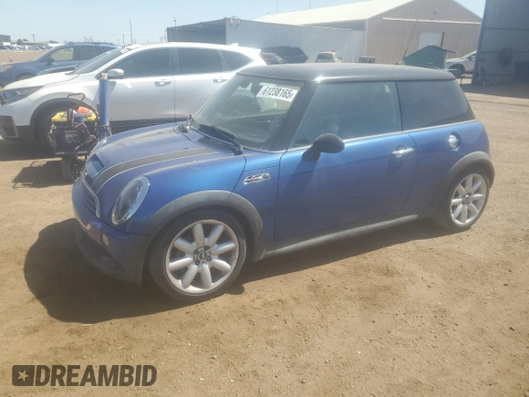 2005 MINI Hardtop S with VIN WMWRE33415TD90833, listed as a Copart auction lot 61238165 with 174,647 mi miles and Salvage title. Bid and sale history available at DreamBid. Image 1.