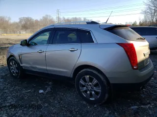 2014 Cadillac SRX Luxury Collection z VIN 3GYFNEE34ES641335, wystawiony jako Copart lot #47519325 z przebiegiem 124 407 mil mil oraz Szkoda całkowita • Salvage title. Historia ofert i sprzedaży dostępna na DreamBid. Obrazek 2.