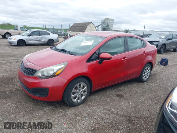 2012 Kia Rio LX with VIN KNADM4A30C6094000, listed as a IAAI auction lot 42059778 with 127,957 mi miles. Bid and sale history available at carsss.com. Image 2.