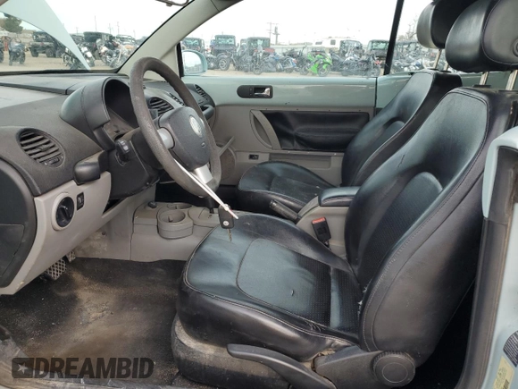 2004 Volkswagen Beetle with VIN 3VWCM21Y64M310431, listed as a Copart auction lot 82449604 with 166,974 mi miles and Salvage Title. Bid and sale history available at DreamBid. Image 7.