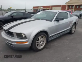 2007 Ford Mustang Deluxe with VIN 1ZVFT80N275331507, listed as a IAAI auction lot 42120778 with 117,021 mi miles. Bid and sale history available at carsss.com. Image 2.