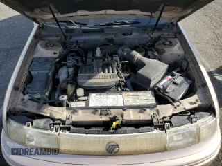 1993 Mercury Sable z VIN 1MELM5849PA655685, wystawiony jako Copart lot #85732984 z przebiegiem 98 081 mil mil oraz Tytuł czysty. Historia ofert i sprzedaży dostępna na DreamBid. Obrazek 11.