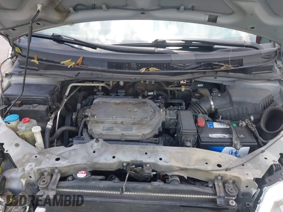 2012 Honda Odyssey EX-L with VIN 5FNRL5H65CB076534, listed as a IAAI auction lot 42440258 with 150,866 mi miles and . Bid and sale history available at DreamBid. Image 10.