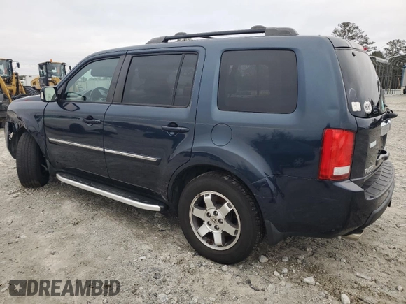 2011 Honda Pilot Touring with VIN 5FNYF4H96BB077391, listed as a Copart auction lot 41520315 with 196,291 mi miles and Salvage Title. Bid and sale history available at DreamBid. Image 2.
