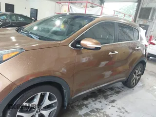 2017 Kia Sportage SX Turbo z VIN KNDPR3A6XH7167204, wystawiony jako IAAI lot #42403880 z przebiegiem 157 308 mil mil oraz . Historia ofert i sprzedaży dostępna na DreamBid. Obrazek 14.