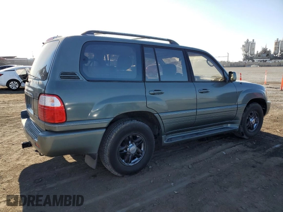 2002 Lexus LX 470 z VIN JTJHT00W723519186, wystawiony jako Copart lot #70190464 z przebiegiem 306 793 mil mil oraz Tytuł czysty. Historia ofert i sprzedaży dostępna na DreamBid. Obrazek 3.