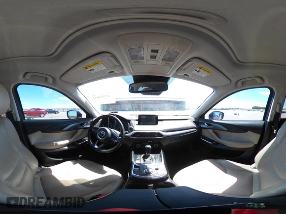 2016 Mazda CX-9 Touring with VIN JM3TCBCY5G0104504, listed as a IAAI auction lot 42314649 with 116,536 mi miles and . Bid and sale history available at DreamBid. Image 18.