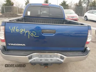 2014 Toyota Tacoma with VIN 3TMLU4EN0EM147243, listed as a IAAI auction lot 41684902 with 308,167 mi miles. Bid and sale history available at carsss.com. Image 15.