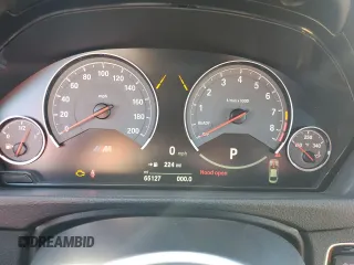 2015 BMW M4 with VIN WBS3R9C55FK330561, listed as a Copart auction lot 40490133 with 65,127 mi miles. Bid and sale history available at carsss.com. Image 9.