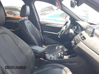 2017 BMW X1 xDrive28i with VIN WBXHT3Z30H4A65417, listed as a IAAI auction lot 42328797 with 103,788 mi miles and . Bid and sale history available at DreamBid. Image 5.