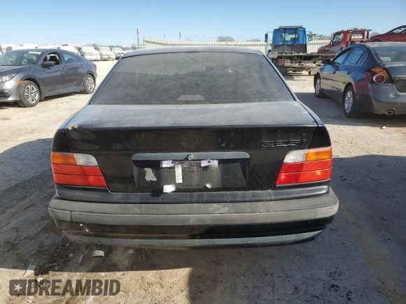 1994 BMW 3 Series 325i with VIN WBACB332XRFE16573, listed as a Copart auction lot 83412134 with 99,320 mi miles and Salvage Title. Bid and sale history available at carsss.com. Image 6.