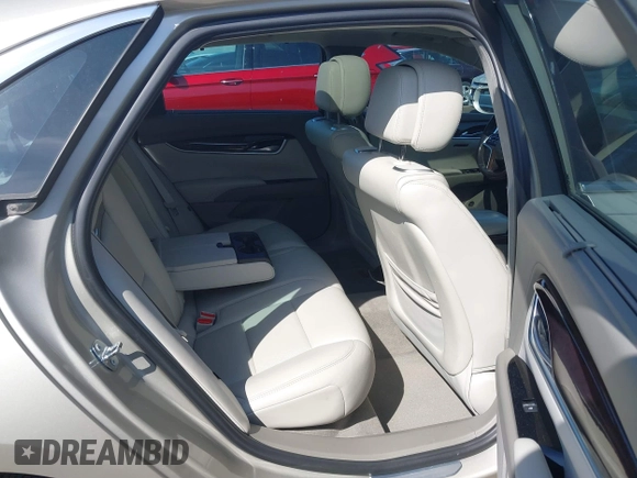 2013 Cadillac XTS Platinum z VIN 2G61U5S37D9209926, wystawiony jako IAAI lot #41754716 z przebiegiem 126 239 mil mil oraz . Historia ofert i sprzedaży dostępna na DreamBid. Obrazek 8.