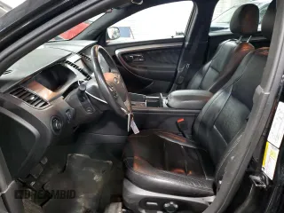 2015 Ford Taurus SEL with VIN 1FAHP2H89FG172117, listed as a Copart auction lot 49491575 with 134,922 mi miles and Salvage Title. Bid and sale history available at carsss.com. Image 7.