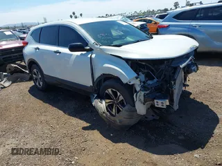 2017 Honda CR-V LX with VIN 2HKRW6H34HH219033, listed as a IAAI auction lot 41948876 with 105,813 mi miles. Bid and sale history available at carsss.com. Image 1.