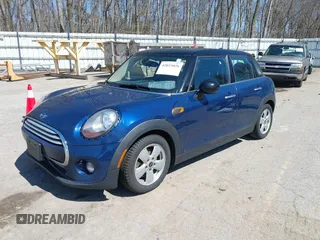 2015 MINI Hardtop 4 Door z VIN WMWXS5C58FT829805, wystawiony jako IAAI lot #42023026 z przebiegiem 141 330 mil mil oraz . Historia ofert i sprzedaży dostępna na DreamBid. Obrazek 17.