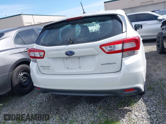 2018 Subaru Impreza with VIN 4S3GTAA6XJ3729301, listed as a IAAI auction lot 41643511 with 91,953 mi miles and . Bid and sale history available at DreamBid. Image 16.
