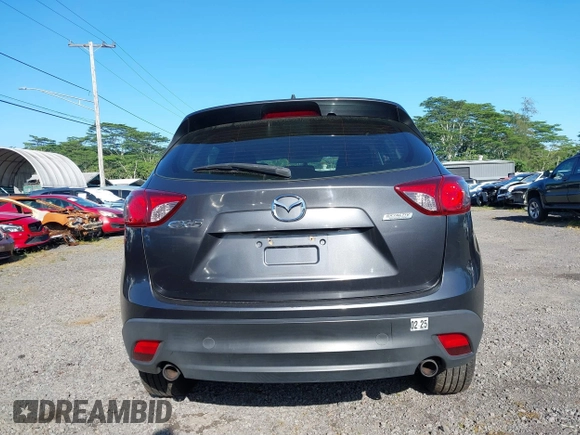 2014 Mazda CX-5 Sport with VIN JM3KE2BE8E0313407, listed as a IAAI auction lot 41215428 with 120,387 mi miles and . Bid and sale history available at carsss.com. Image 16.