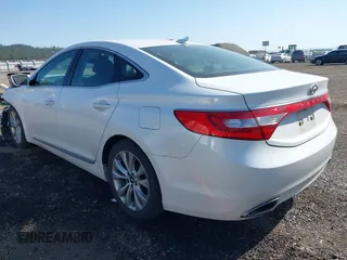2014 Hyundai Azera with VIN KMHFG4JGXEA345249, listed as a IAAI auction lot 42118221 with 66,567 mi miles and . Bid and sale history available at carsss.com. Image 3.