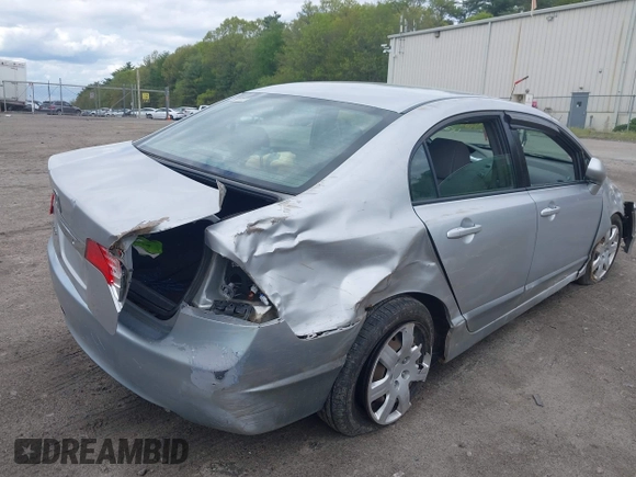 2010 Honda Civic LX with VIN 2HGFA1F59AH323381, listed as a IAAI auction lot 42181040 with 320,419 mi miles and . Bid and sale history available at DreamBid. Image 4.