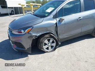 2020 Chevrolet Trax LT with VIN 3GNCJLSBXLL322296, listed as a IAAI auction lot 42030809 with 51,367 mi miles and . Bid and sale history available at DreamBid. Image 6.