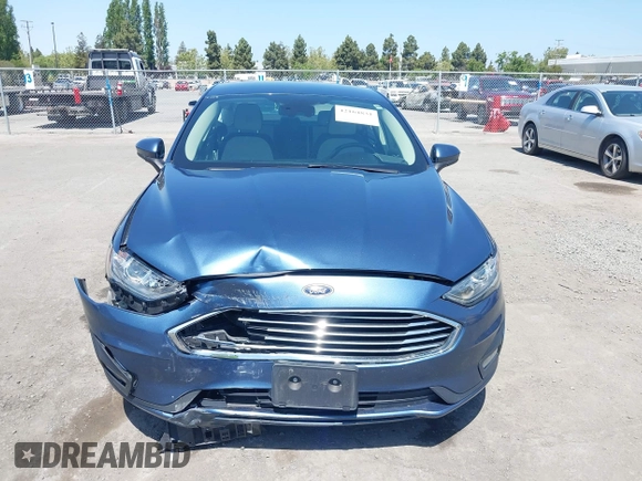 2019 Ford Fusion SE with VIN 3FA6P0HD6KR177660, listed as a IAAI auction lot 42164831 with 66,585 mi miles and . Bid and sale history available at DreamBid. Image 6.