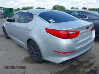 2015 Kia Optima EX with VIN 5XXGN4A70FG360623, listed as a IAAI auction lot 42112315 with 262,058 mi miles and . Bid and sale history available at carsss.com. Image 3.
