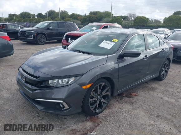 2019 Honda Civic Sport with VIN 2HGFC2F89KH563333, listed as a IAAI auction lot 41959217 with 66,068 mi miles and . Bid and sale history available at DreamBid. Image 17.