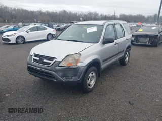 2003 Honda CR-V LX with VIN JHLRD685X3C005548, listed as a IAAI auction lot 41955514 with 206,661 mi miles and . Bid and sale history available at DreamBid. Image 18.