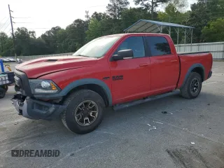 2017 Ram 1500 Rebel z VIN 1C6RR6YT2HS561287, wystawiony jako Copart lot #54116545 z przebiegiem 99 535 mil mil oraz Szkoda całkowita • Salvage title. Historia ofert i sprzedaży dostępna na DreamBid. Obrazek 1.