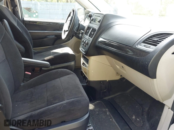 2013 Dodge Grand Caravan SXT with VIN 2C4RDGCG4DR636798, listed as a IAAI auction lot 42240550 with 96,100 mi miles and . Bid and sale history available at DreamBid. Image 5.