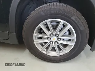 2022 Chevrolet Traverse LT Cloth with VIN 1GNEVMKW7NJ123108, listed as a IAAI auction lot 42854233 with 63,624 mi miles and . Bid and sale history available at DreamBid. Image 6.