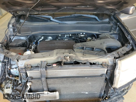 2012 Honda Pilot EX-L with VIN 5FNYF4H50CB058303, listed as a Copart auction lot 60607375 with 147,939 mi miles and Salvage title. Bid and sale history available at DreamBid. Image 12.