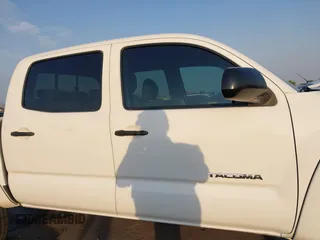 2014 Toyota Tacoma PreRunner with VIN 3TMJU4GN3EM160587, listed as a IAAI auction lot 42710985 with 200,867 mi miles and . Bid and sale history available at DreamBid. Image 13.