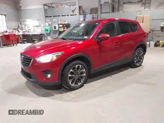 2016 Mazda CX-5 Grand Touring with VIN JM3KE4DY6G0690923, listed as a IAAI auction lot 41875553 with 179,489 mi miles. Bid and sale history available at carsss.com. Image 17.